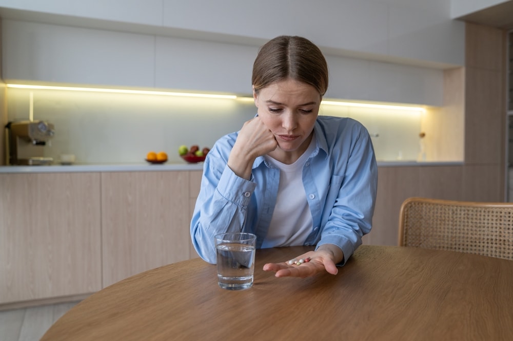 donna prende integratori per stanchezza